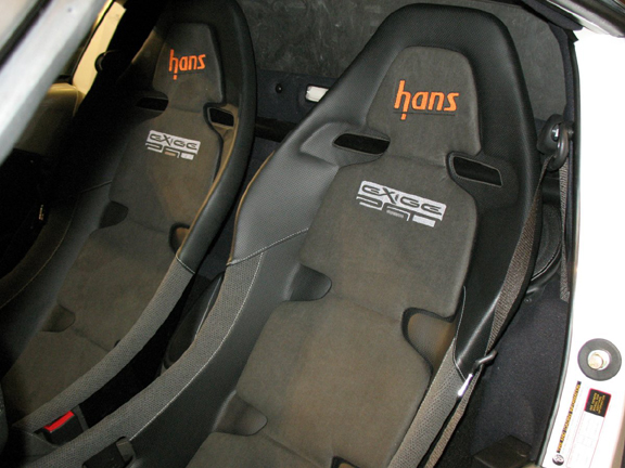 Reverie carbon composite seats and HANS devices