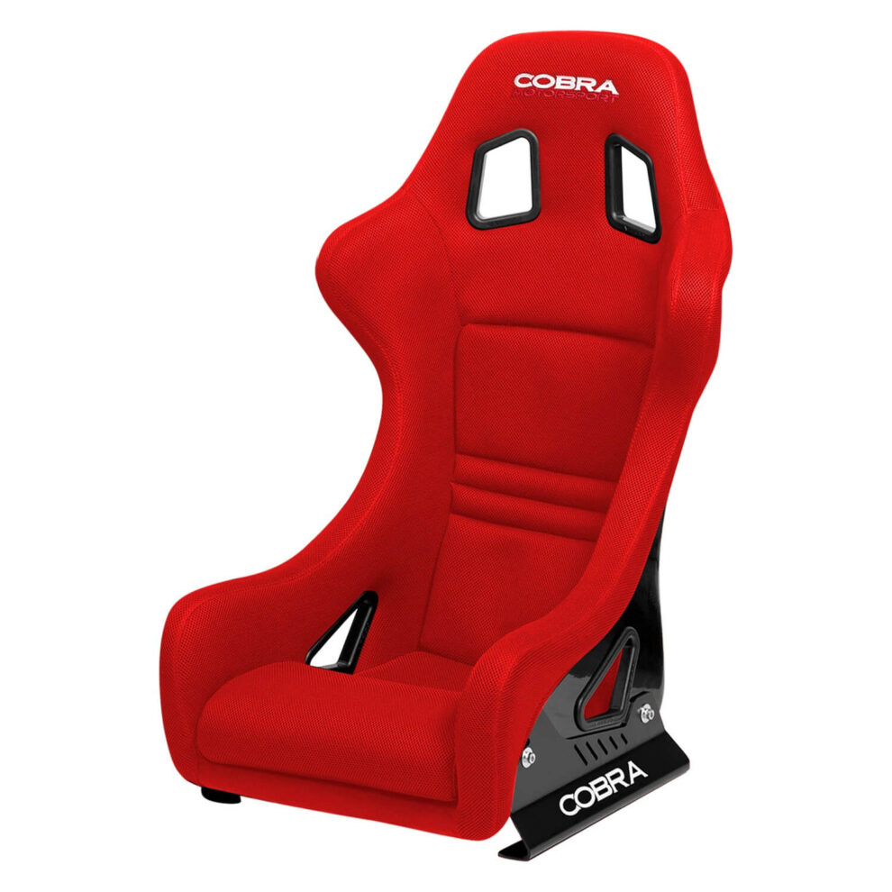 A Cobra Suzuka T bucket seat in red on a white background, showing the harness slots and side mount