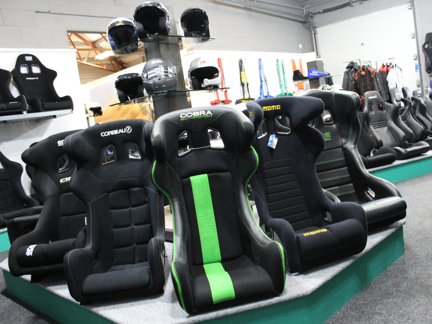 Rows of motorsport bucket seats on display at the GSM Performance showroom