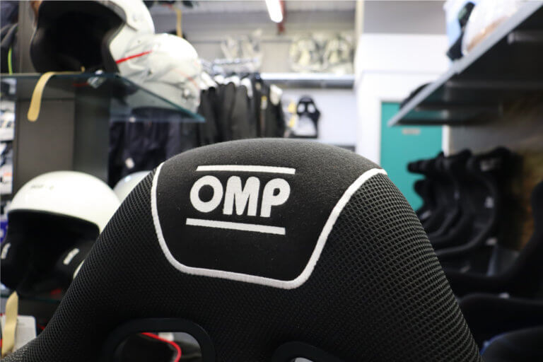 Close view of the shoulder openings and OMP logo on the WRC-R and WRC-R XL bucket seats