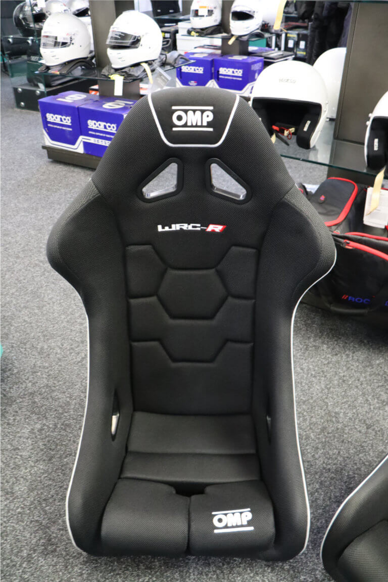 OMP WRC-R XL fibreglass bucket seat, front view, showing the wider shell and taller shoulder openings