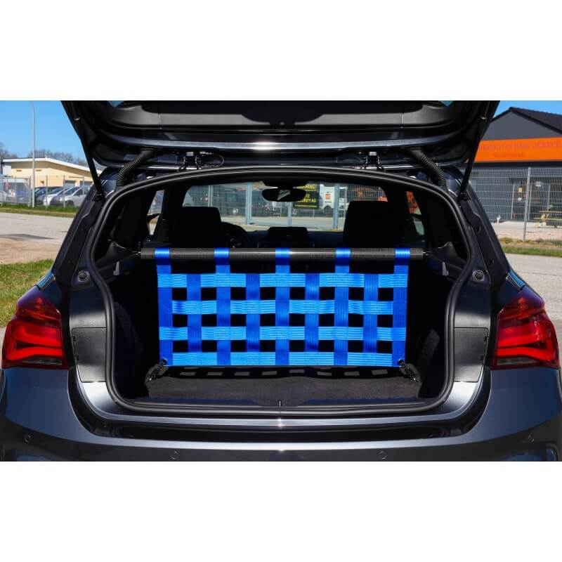 The open boot of a BMW 1 Series with a black strut bar and a blue webbing net across it, the front seats visible beyond