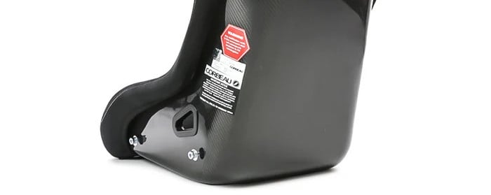 Close up of the side mounting bolt points on the flank of a Corbeau bucket seat shell