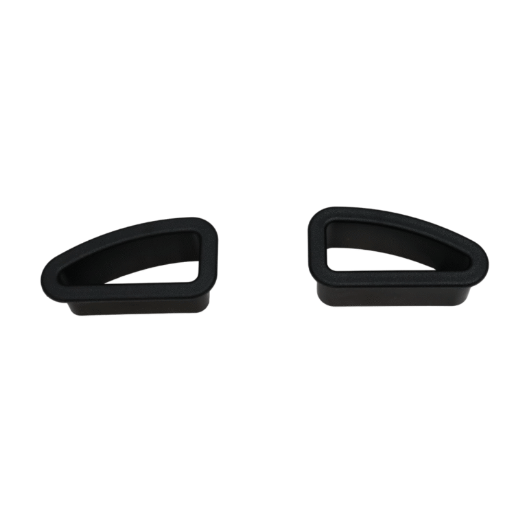 Two black plastic harness slot surrounds on a white background