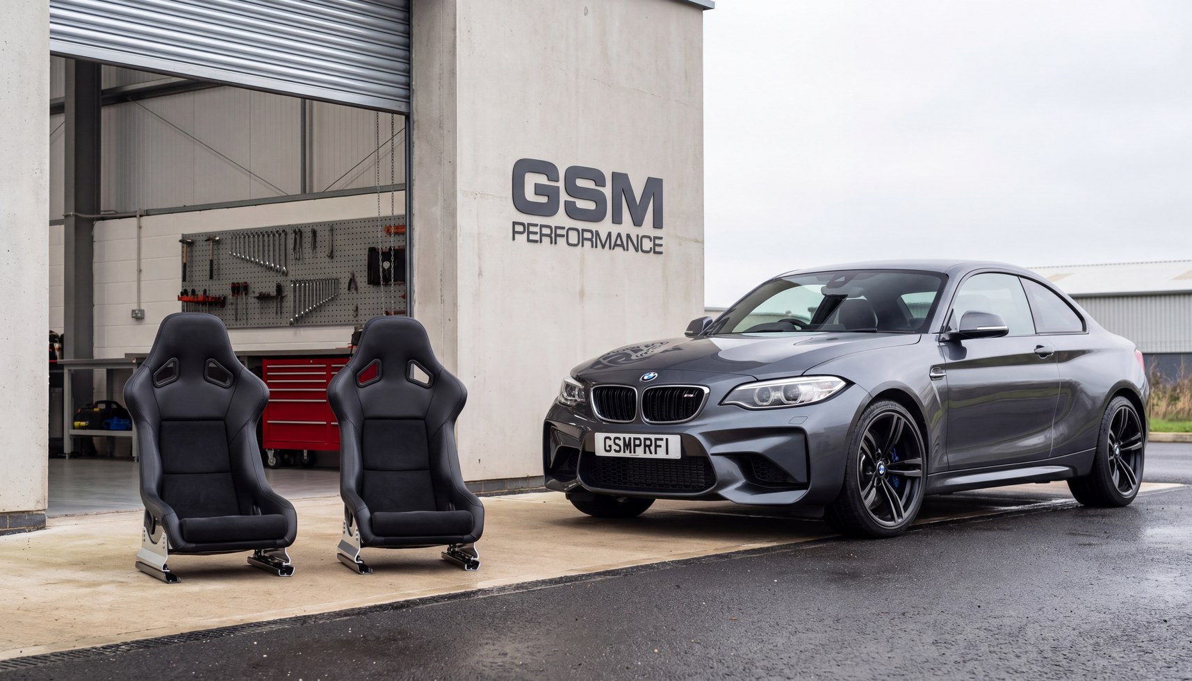 BMW M2 F87 outside the GSM Performance workshop with a pair of bucket seats set up for the Clubsport look