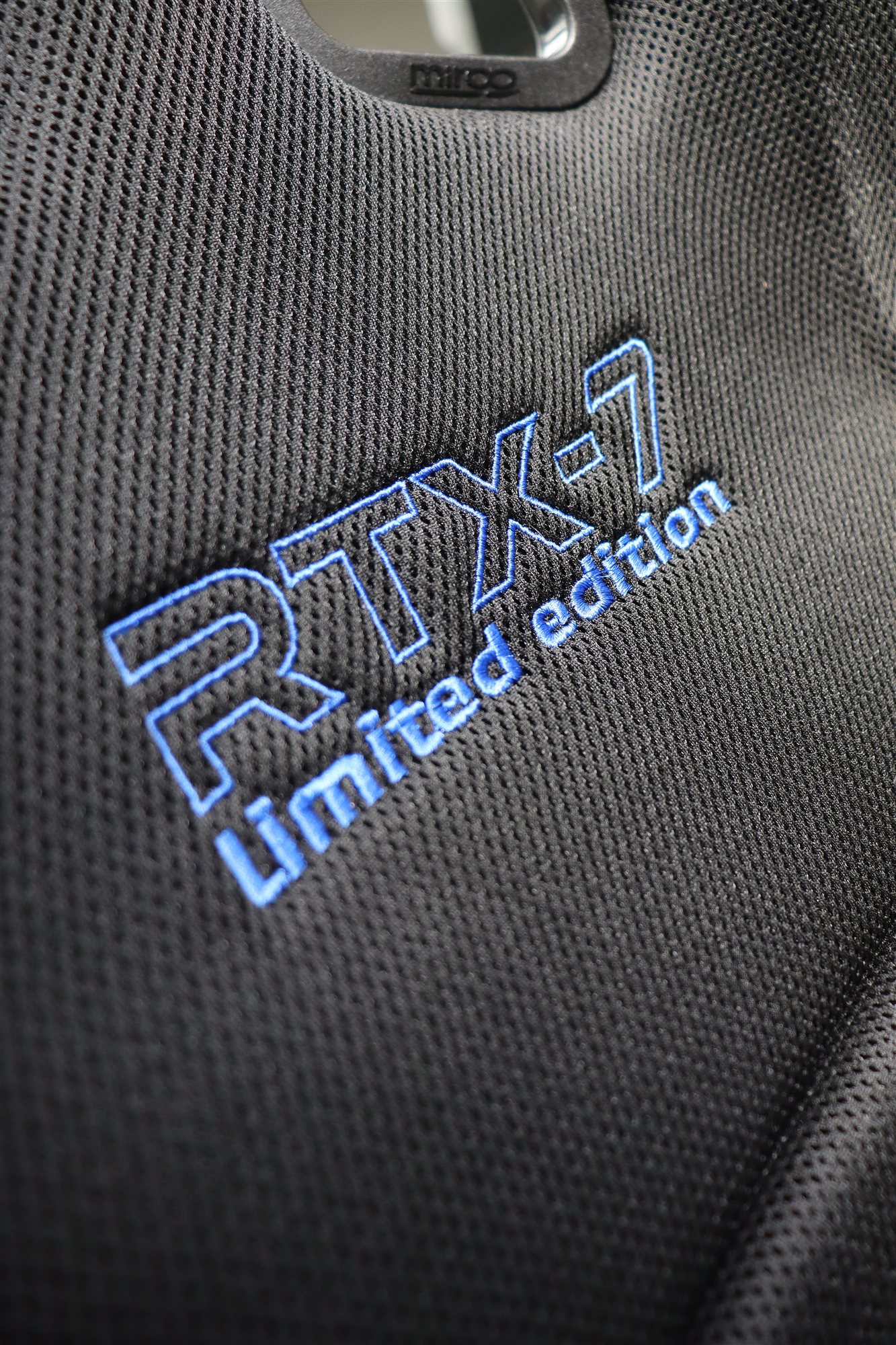 Blue RTX-7 Limited Edition embroidery on the backrest of a Mirco bucket seat