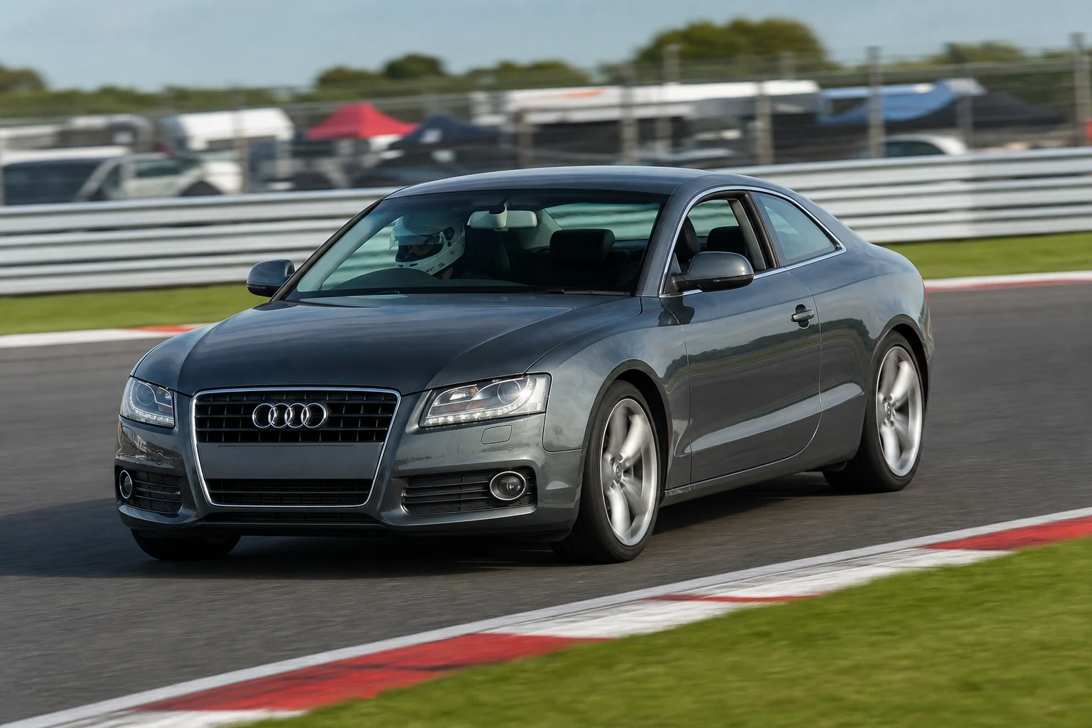 Audi A5 8T/8F 1st Gen on track with a helmeted driver