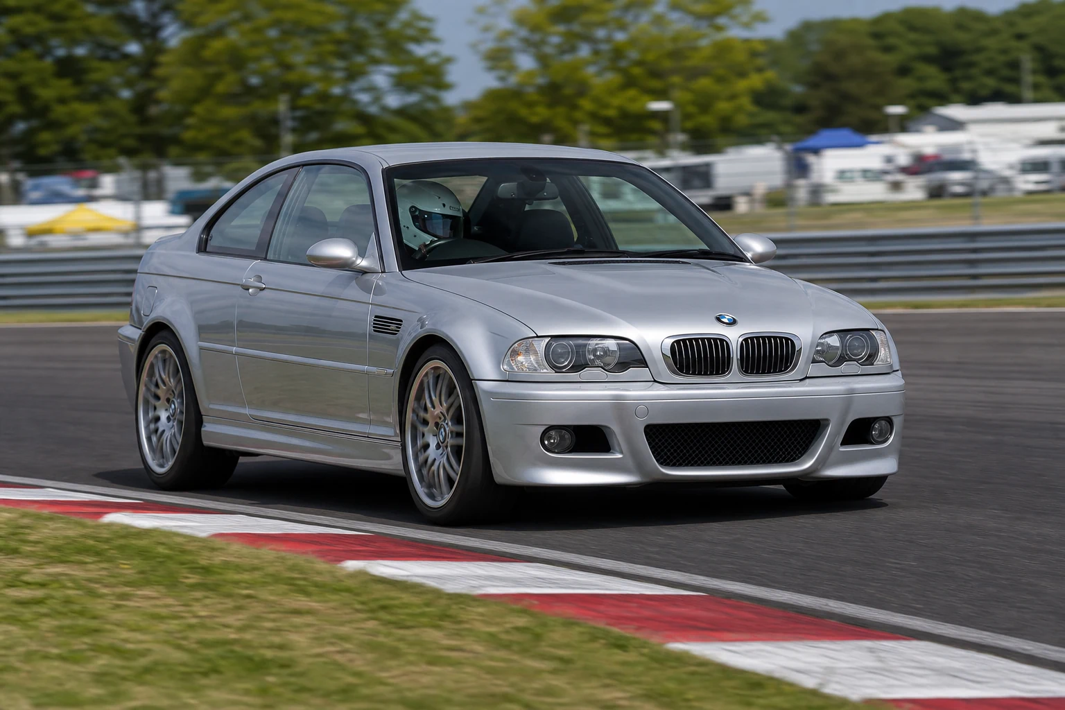 BMW E46 on track with a helmeted driver