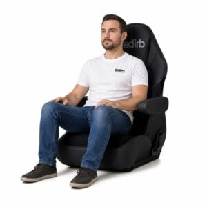 Person seated in Bride edirb 132 Reclining Sports Seat (part I32NSP) showing real-world seat size and fit – GSM Performance