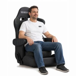 Person seated in Bride EUROGHOST Reclining Sports Seat (part E57CM1) showing real-world seat size and fit – GSM Performance
