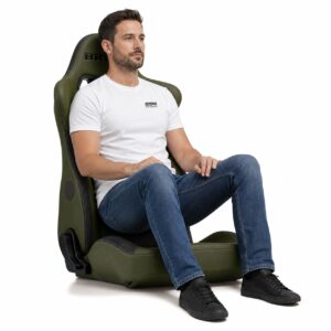 Person seated in Bride EUROGHOST X Reclining Sports Seat (part E54CM3) showing real-world seat size and fit – GSM Performance