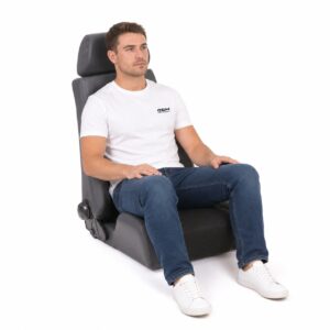 Person seated in Cobra Le Mans Reclining Office Seat (part LMS-V-S-BK-6) showing real-world seat size and fit – GSM Performance
