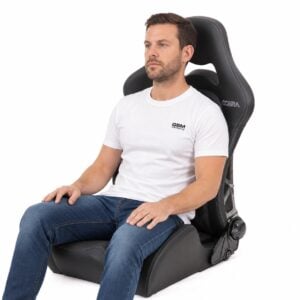 Person seated in Cobra Misano Anniversary Reclining Sport Seat (part MSL-30) showing real-world seat size and fit – GSM Performance