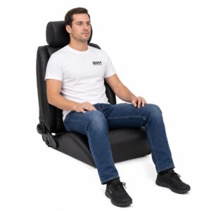 Person seated in Cobra Stuttgart Leather Reclining Office Seat showing real-world seat size and fit – GSM Performance