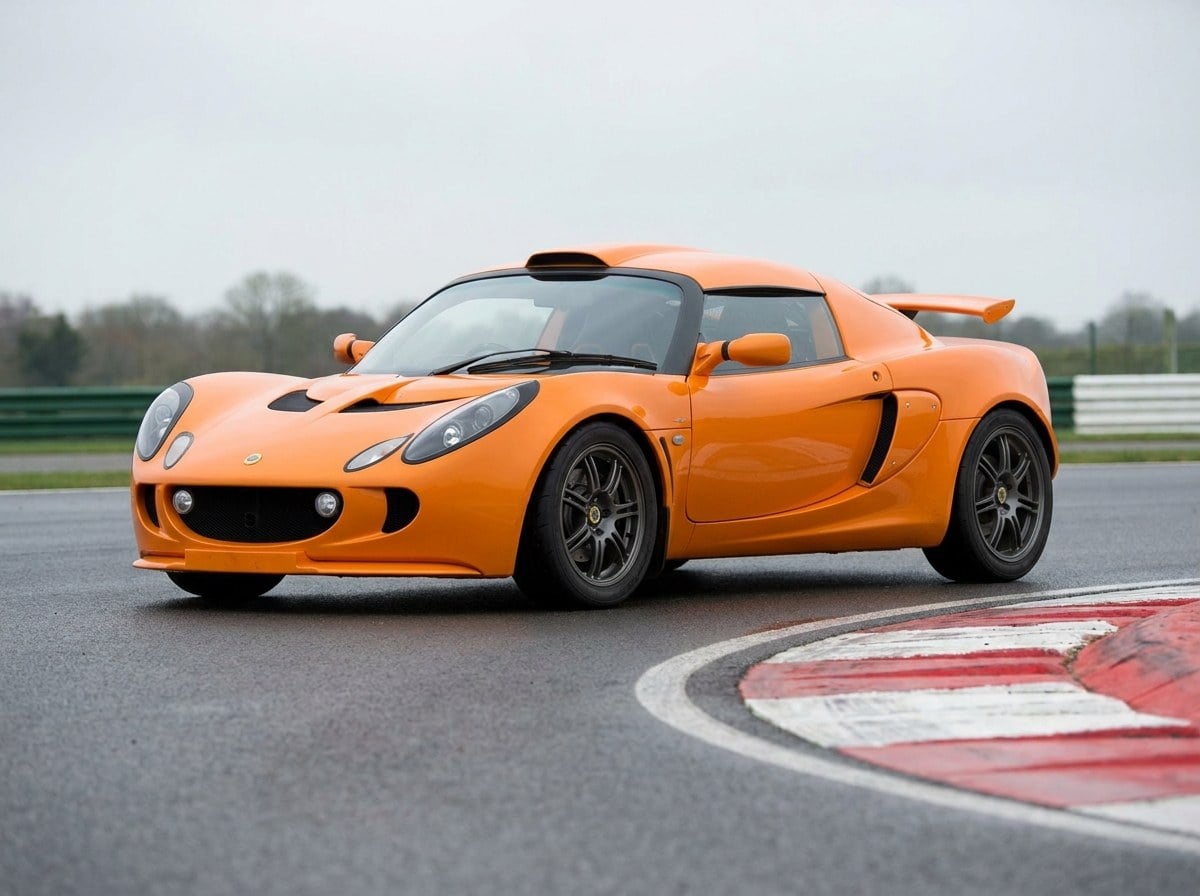 Chrome orange Lotus Exige S2 at a British circuit apex