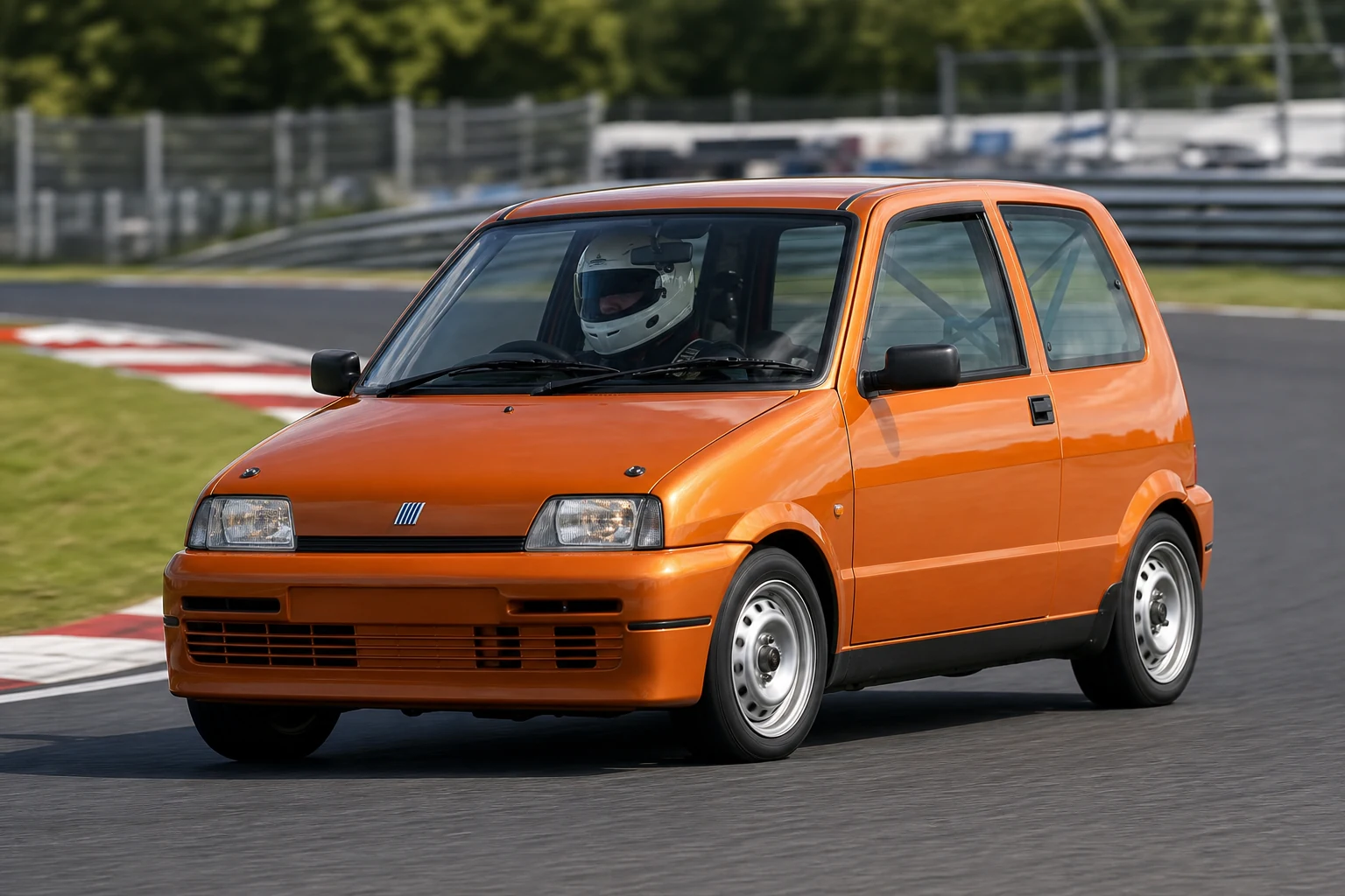 Fiat Cinquecento on track with a helmeted driver