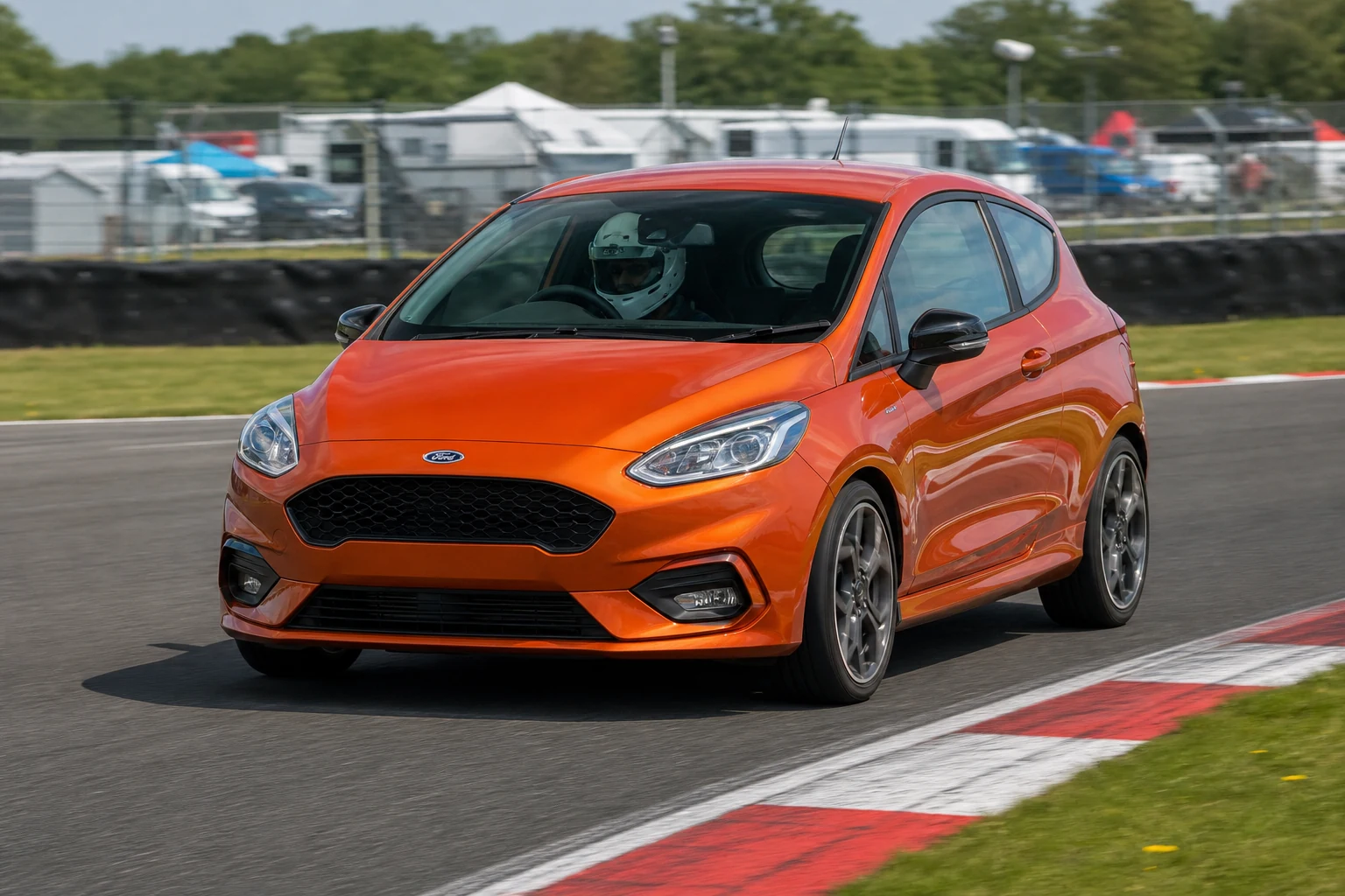 Ford Fiesta MK8 on track with a helmeted driver