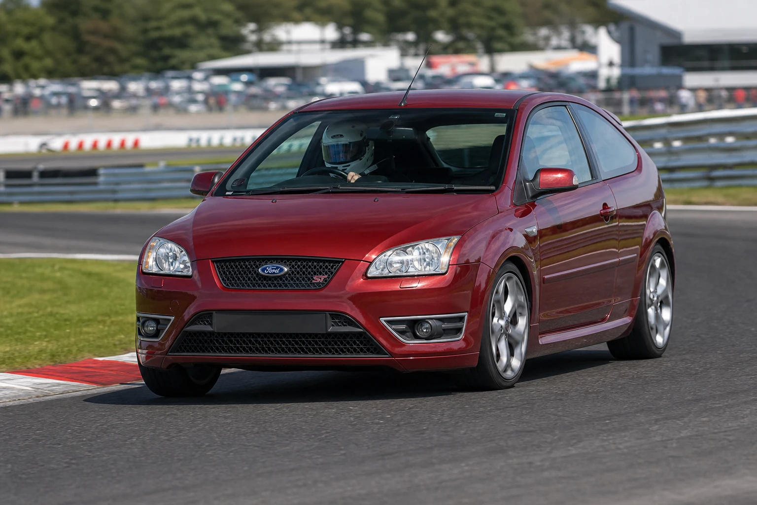 Ford Focus MK2 ST 225 on track with a helmeted driver