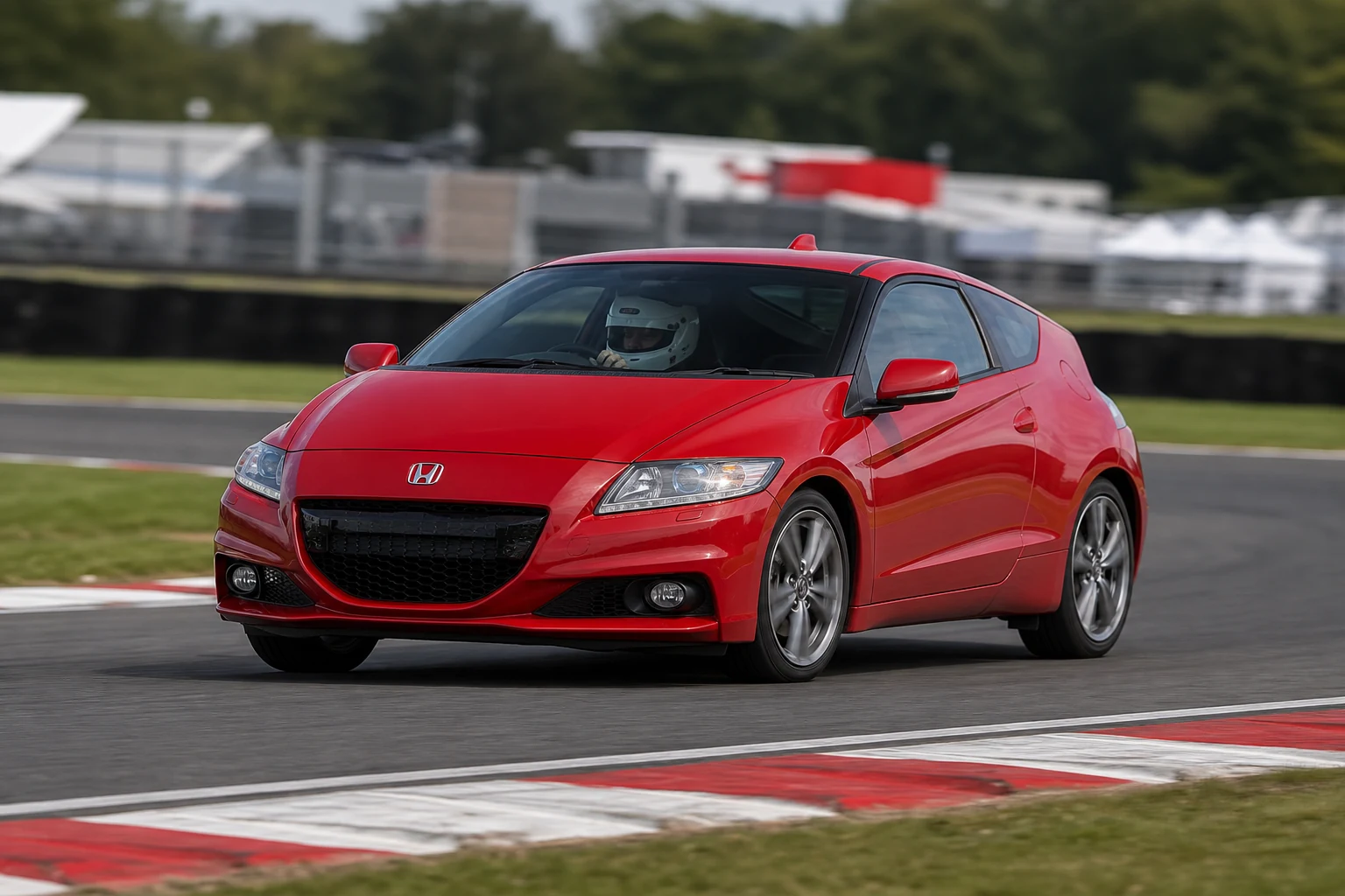 Honda CRZ on track with a helmeted driver
