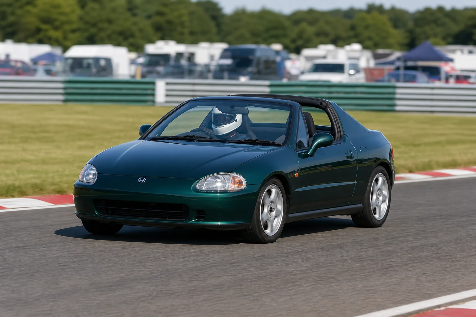 Honda Del Sol on track with a helmeted driver
