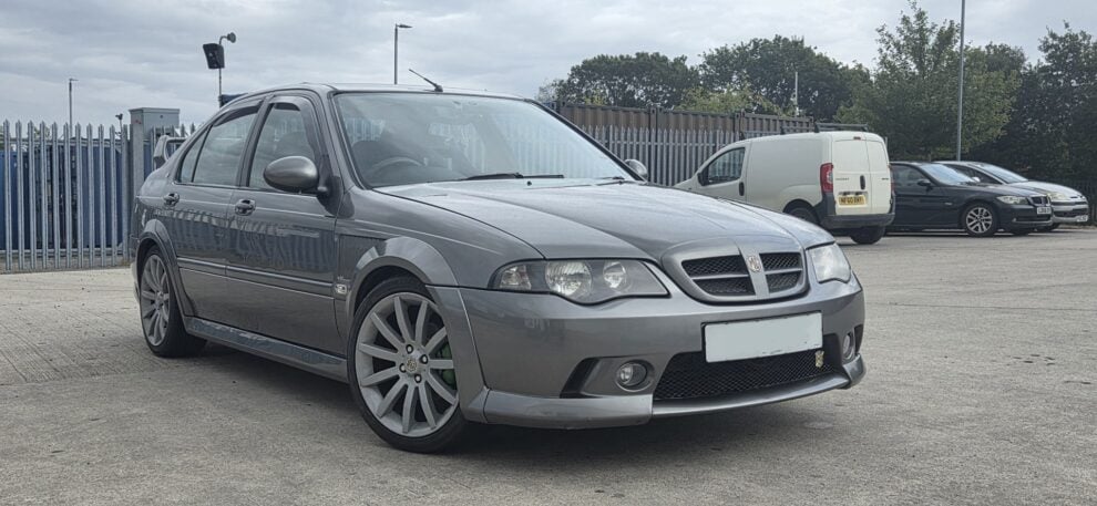 Grey MG ZS saloon track day build parked outside on big multi spoke alloys