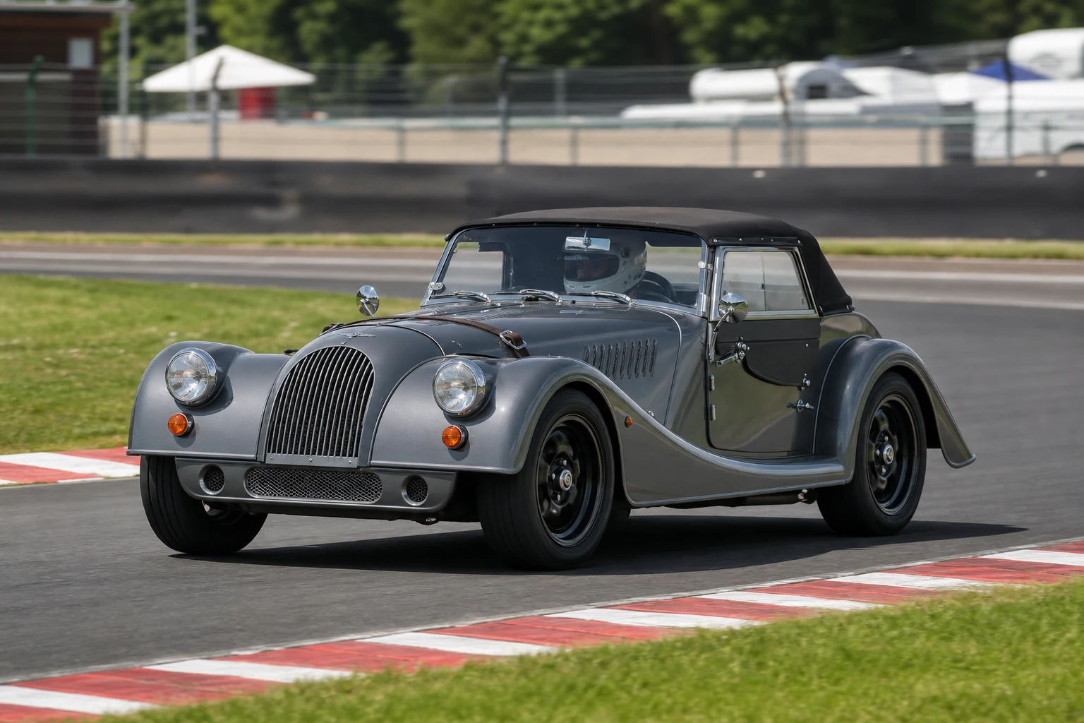 Morgan Speedster (Plus 8) on track with a helmeted driver