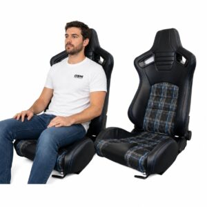 Person seated in Pair of Auto Style GT Blue Tartan Reclining Seats (part SS 85B-X2) showing real-world seat size and fit – GSM Performance