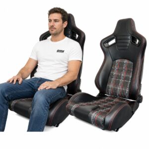 Person seated in Pair of Auto Style GT Red Tartan Reclining Seats (part SS 85R-X2) showing real-world seat size and fit – GSM Performance