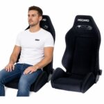 Person seated in Pair of Recaro Speed Reclining Sport Seats (part 295.07.0583A-X2) showing real-world seat size and fit – GSM Performance