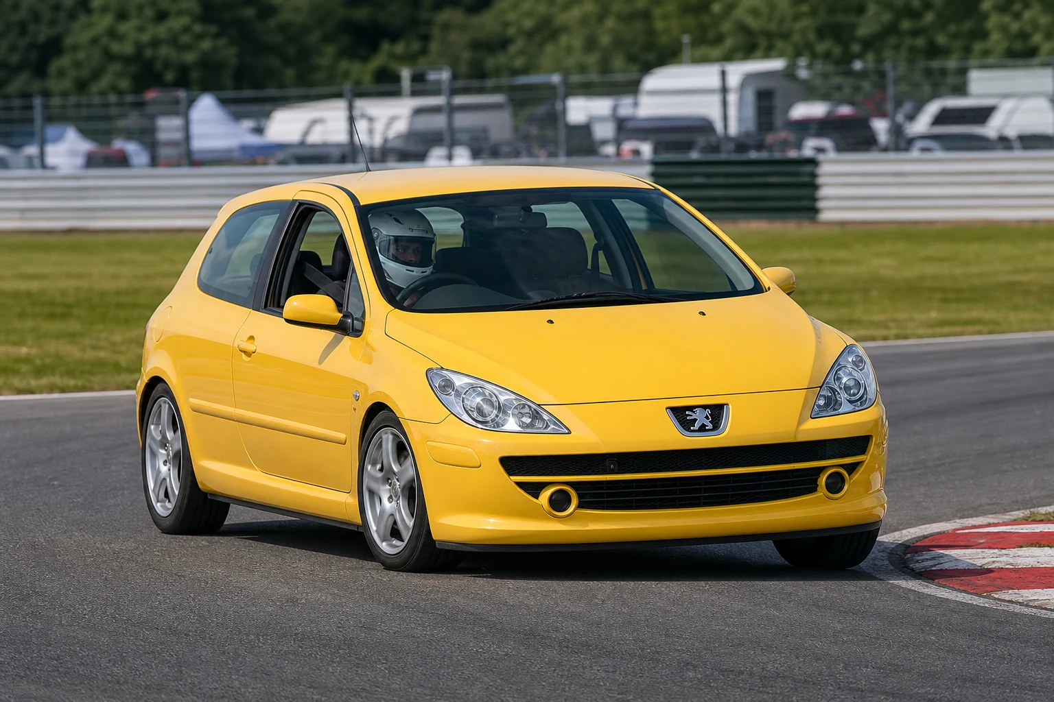 Peugeot 307 on track with a helmeted driver