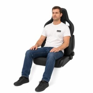 Person seated in Recaro Cross Sportster CS Reclining Sport Seat with Side Airbag (part 415.00) showing real-world seat size and fit – GSM Performance