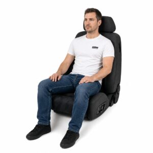 Person seated in Recaro Ergomed E Reclining Sport Seat with SAB showing real-world seat size and fit – GSM Performance