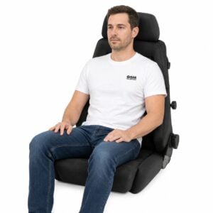 Person seated in Recaro Expert M Reclining Sport Seat (part 045.00.0) showing real-world seat size and fit – GSM Performance