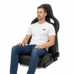 Person seated in Recaro Sportster CS Reclining Sport Seat with Side Airbag (part 411.00) showing real-world seat size and fit – GSM Performance