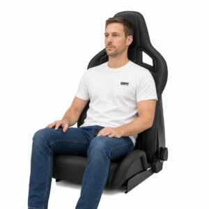 Person seated in Recaro Sportster CS Reclining Sport Seat with Side Airbag (part 411.00) showing real-world seat size and fit – GSM Performance