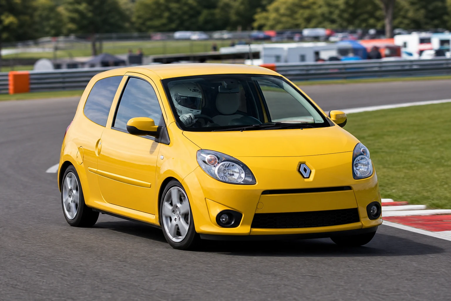 Renault Twingo MK2 on track with a helmeted driver