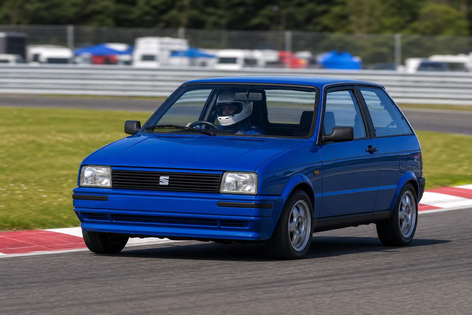 Seat Ibiza MK1 on track with a helmeted driver