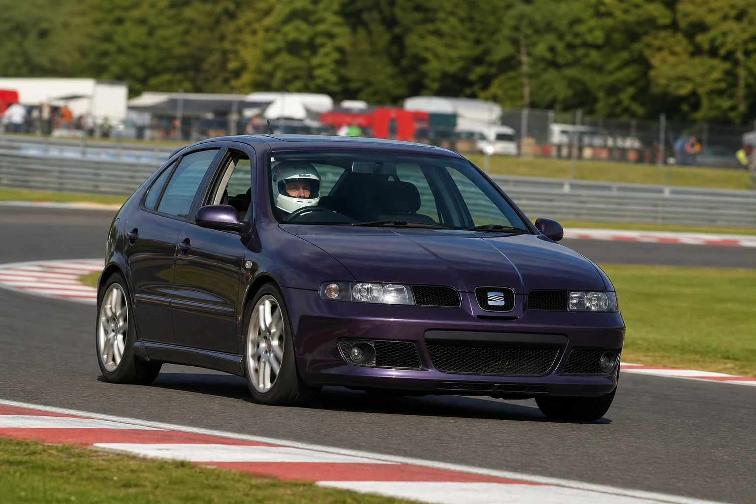 Seat Leon MK1 on track with a helmeted driver