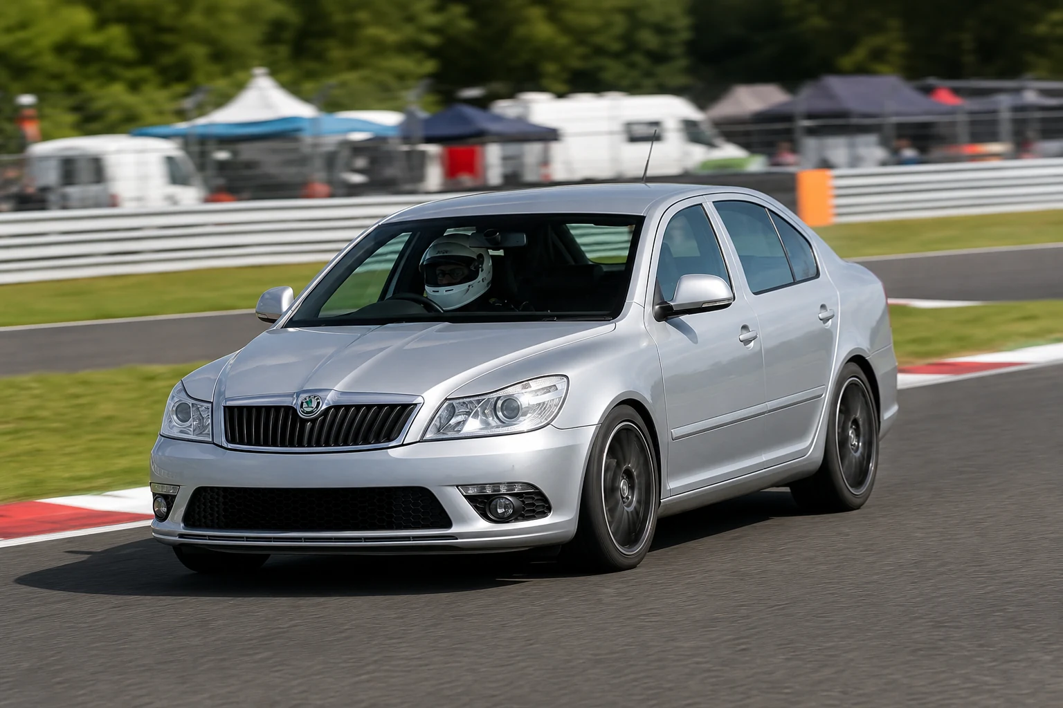 Skoda Octavia Mk2 on track with a helmeted driver