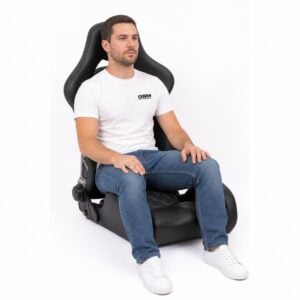 Person seated in Takata Drift Pro LE reclining sport Seat (part 77002) showing real-world seat size and fit – GSM Performance