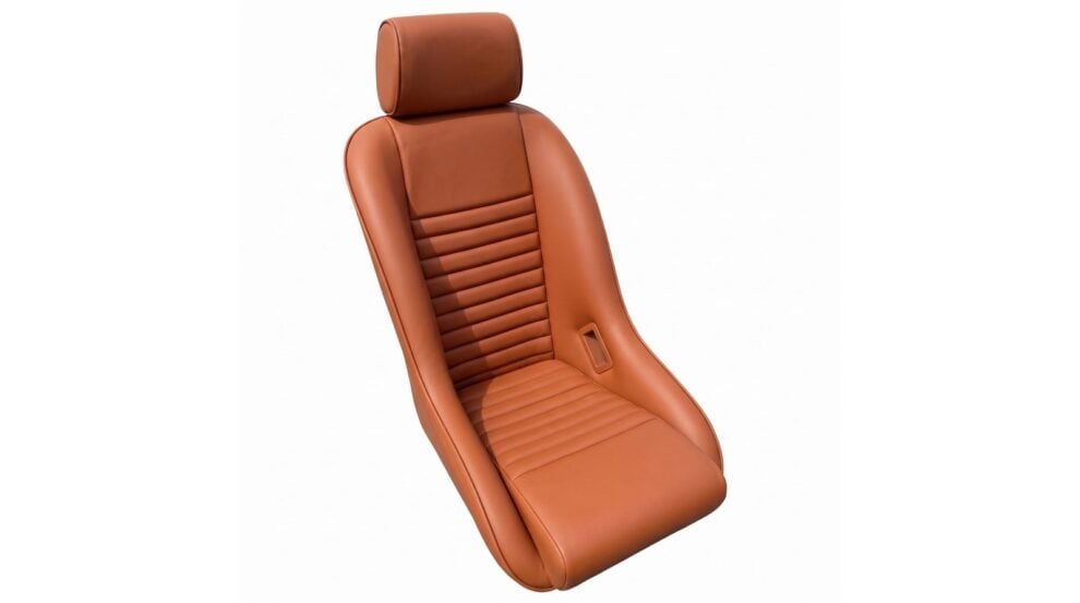Cobra Classic GT Heritage Edition bucket seat in cognac tan with horizontal fluted centre panels across the backrest and cushion, a smooth surround and a separate headrest