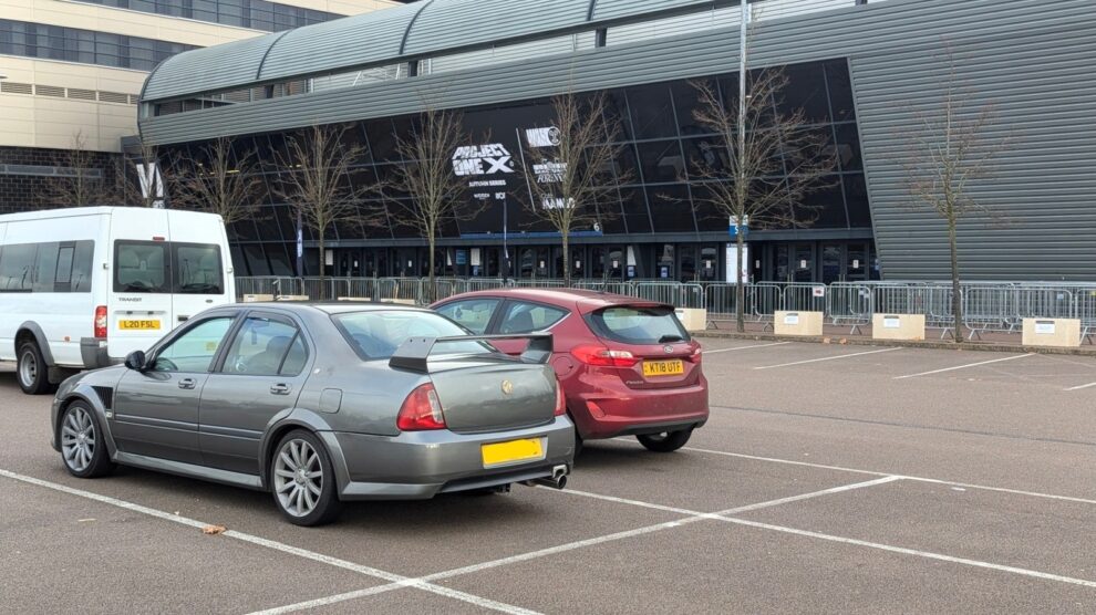 The MG ZS parked outside a large venue in Milton Keynes at night in November 2024
