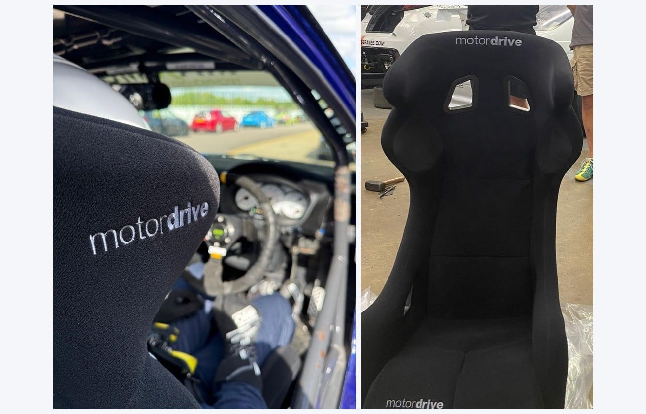 The Motordrive wordmark embroidered on the outer face of a race seat shoulder wing, and one of the new Motordrive seats photographed before it was fitted