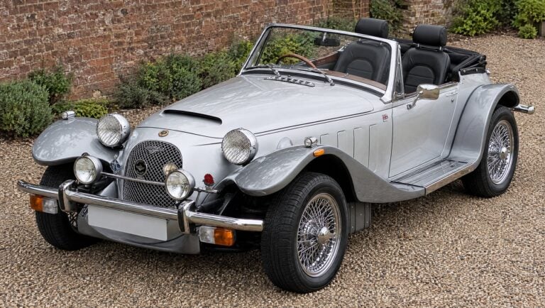 Silver Panther Kallista with the roof down and a pair of black vinyl Corbeau Sportsman reclining seats in the cockpit