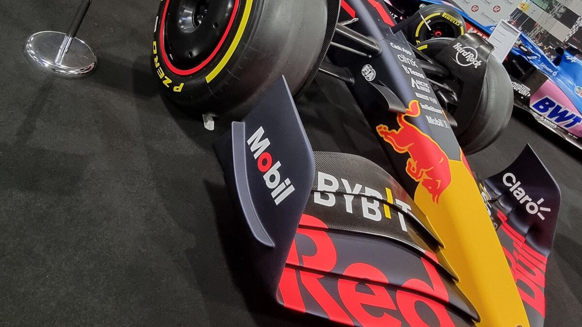 The 2022 Red Bull RB18 Formula One car on display at Autosport International 2023, seen from the front