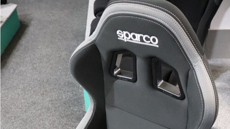 A Sparco R100 reclining sport seat in black and grey on the showroom floor